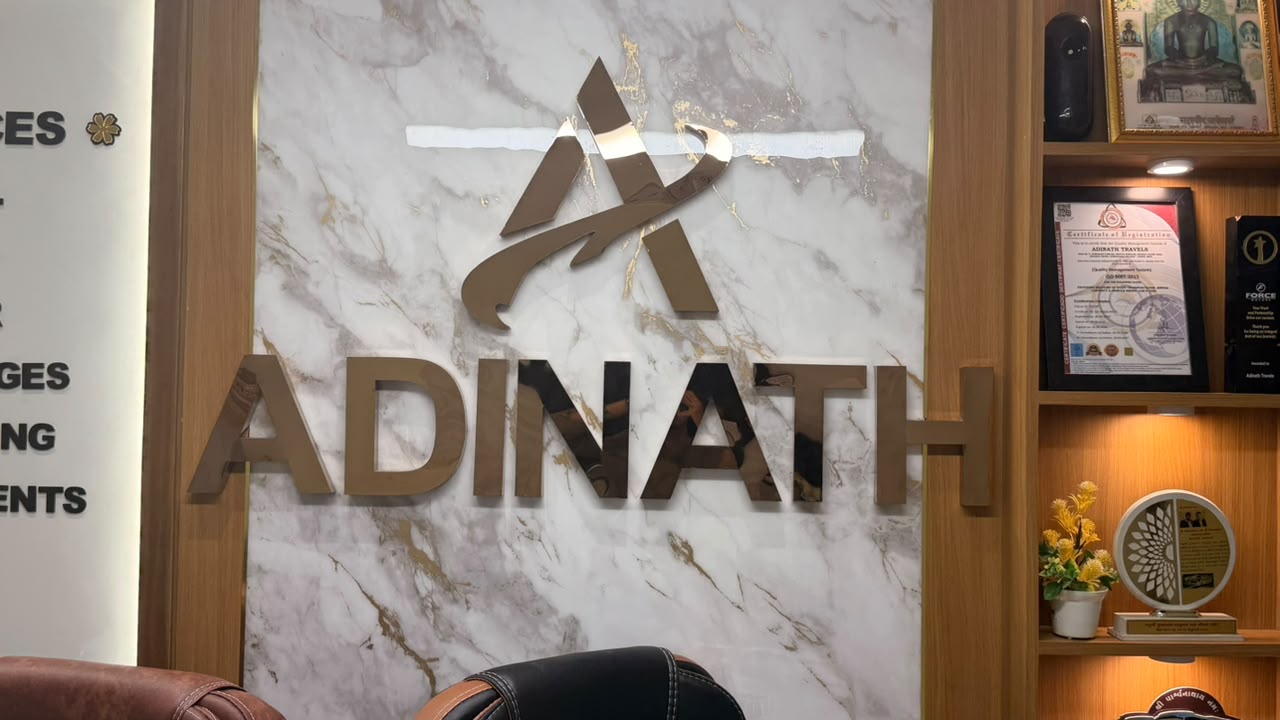 Adinath Travels signage and branding CBD Mall Zundal branch